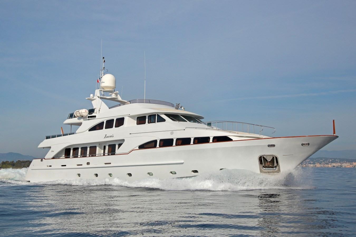 a white yacht on the water aboard INOUIS Yacht for Sale