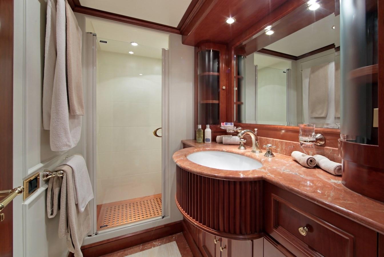 a bathroom with a large mirror aboard INOUIS Yacht for Sale