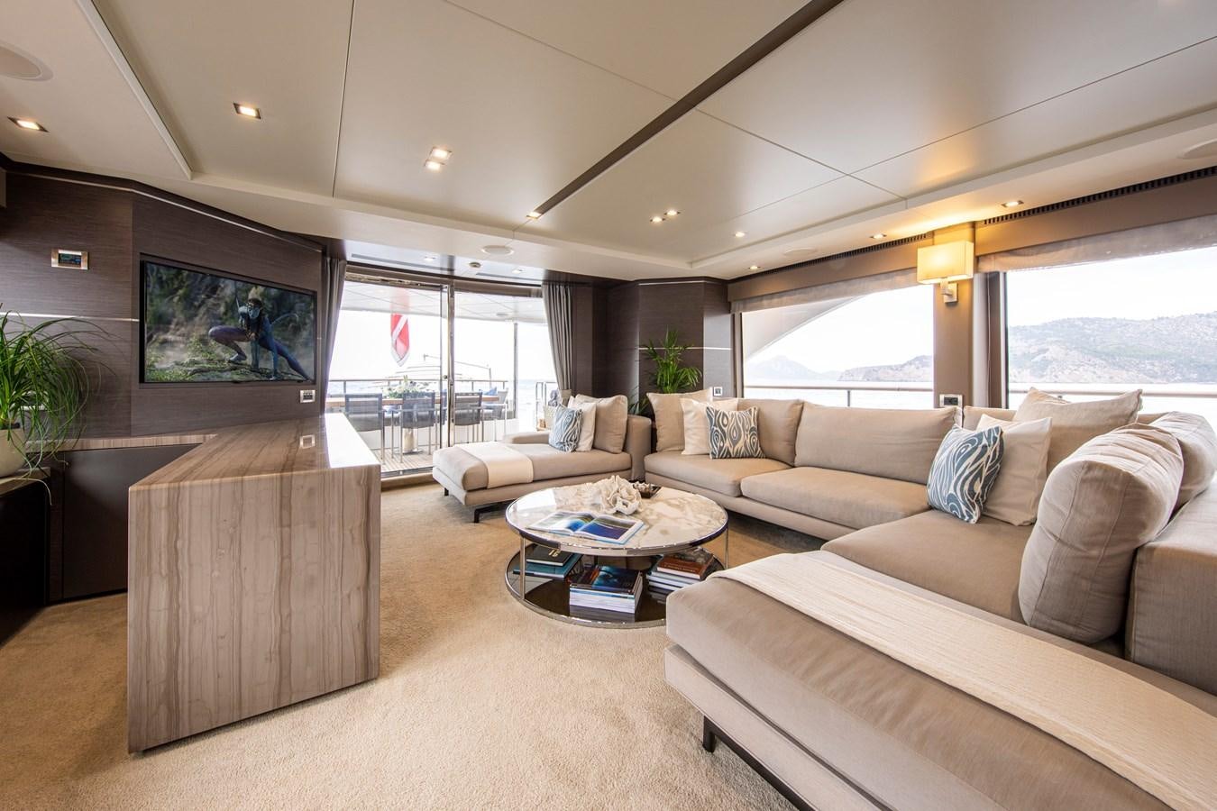 a living room with a couch and a tv aboard ORSO 3 Yacht for Sale