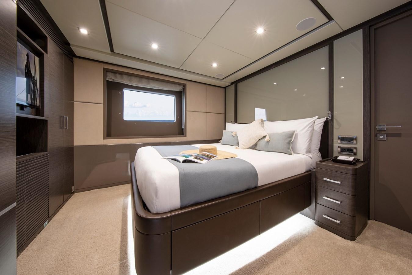 a room with a bed and a tv aboard ORSO 3 Yacht for Sale
