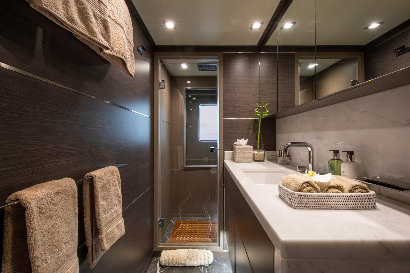 a bathroom with a sink and a mirror aboard ORSO 3 Yacht for Sale