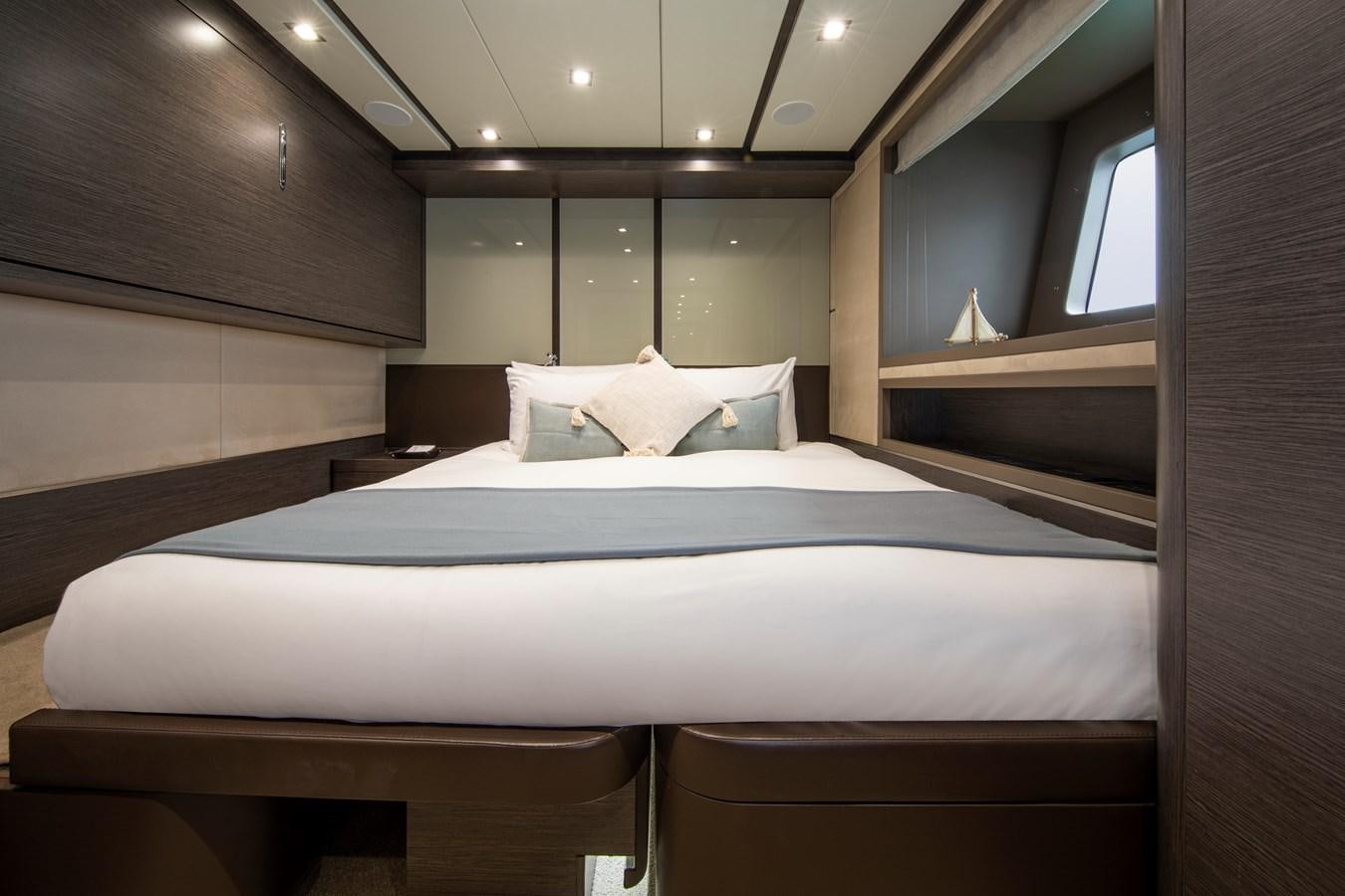 a bed in a room aboard ORSO 3 Yacht for Sale