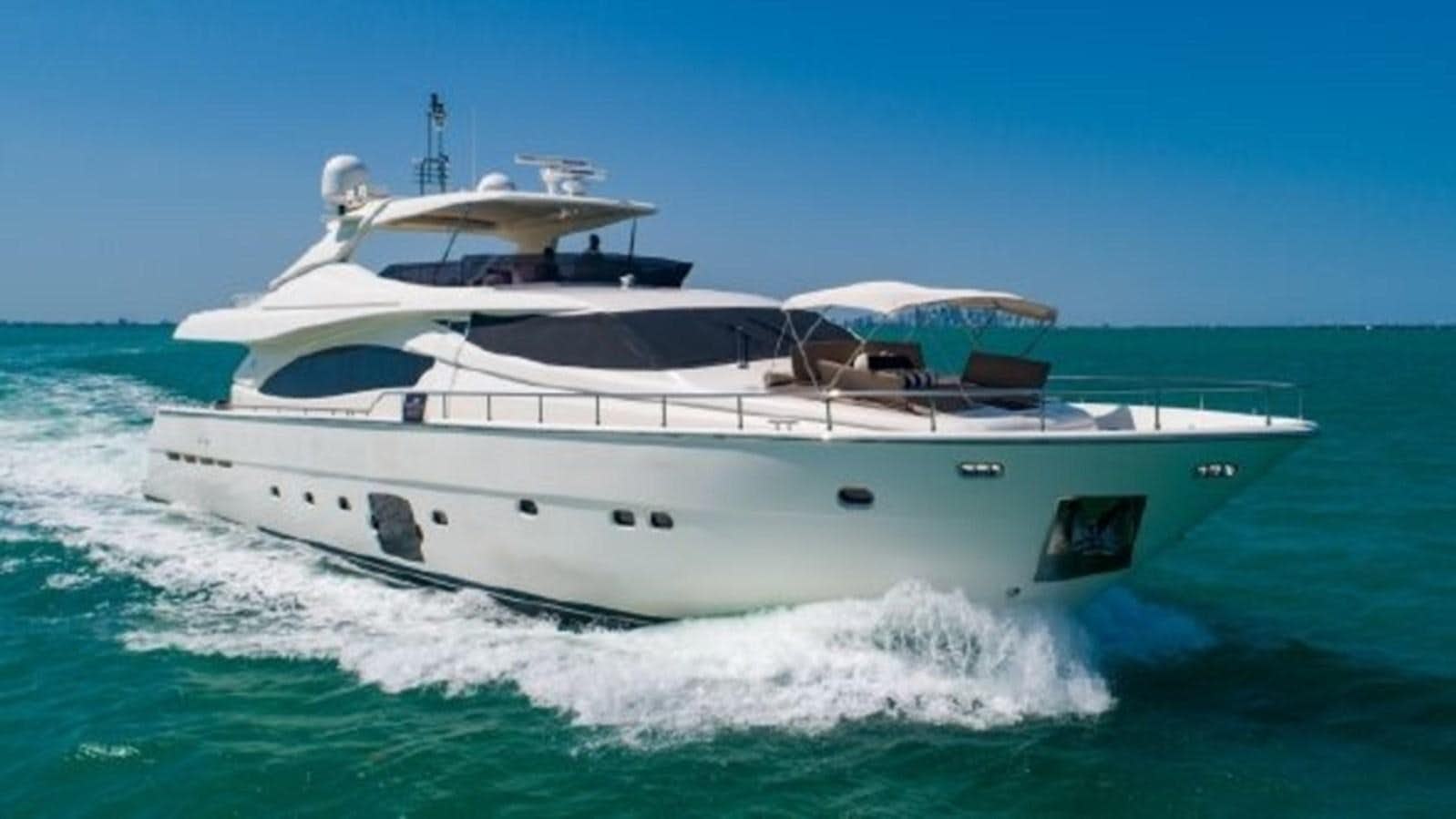 a white yacht on the water aboard CINQUE MARE Yacht for Sale