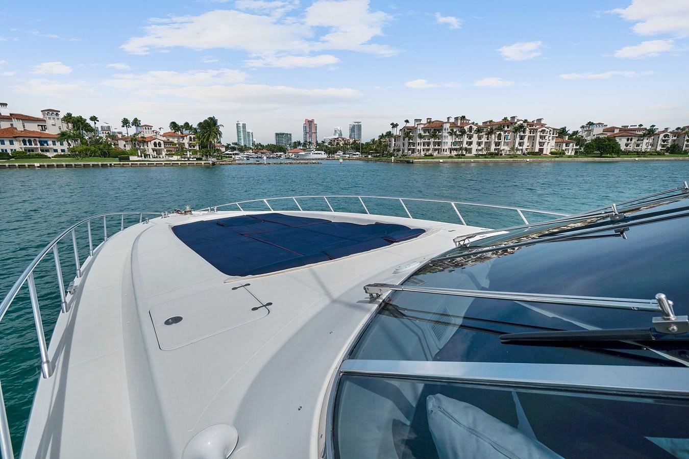 a boat on the water aboard HAKUNA MATATA Yacht for Sale