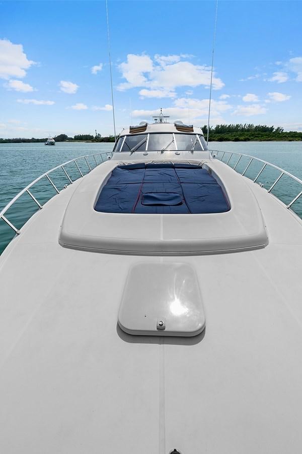 a boat on a body of water aboard HAKUNA MATATA Yacht for Sale