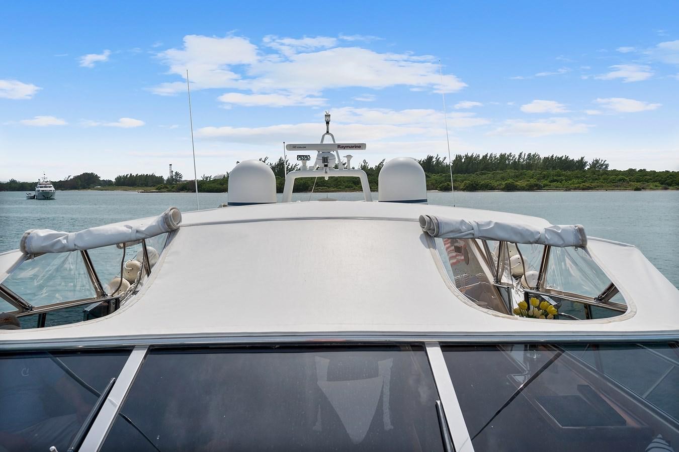 a boat on the water aboard HAKUNA MATATA Yacht for Sale