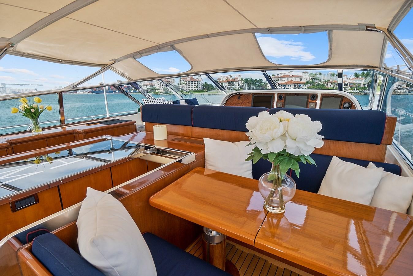 a boat with white flowers in it aboard HAKUNA MATATA Yacht for Sale