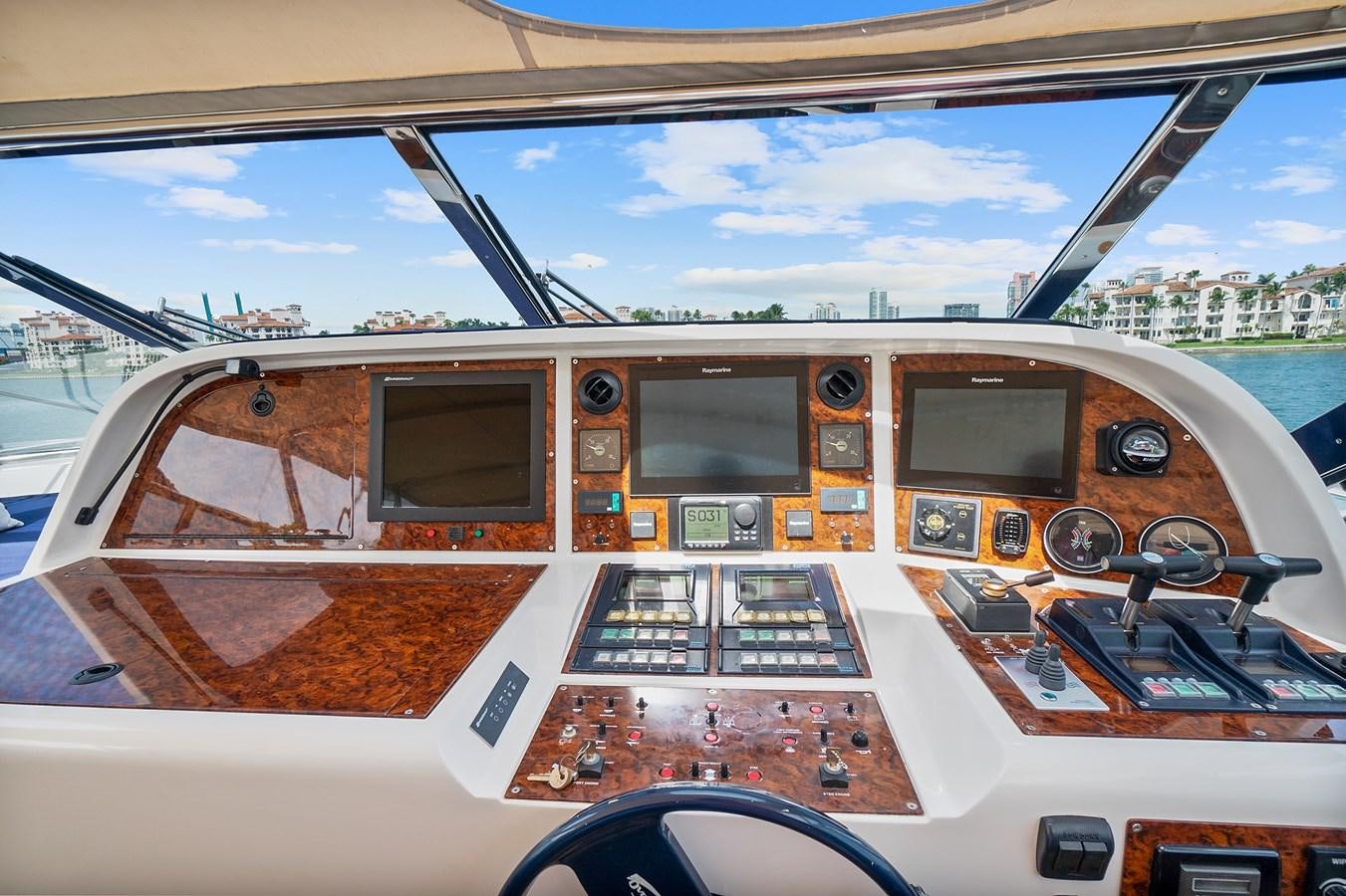 the inside of a cockpit aboard HAKUNA MATATA Yacht for Sale