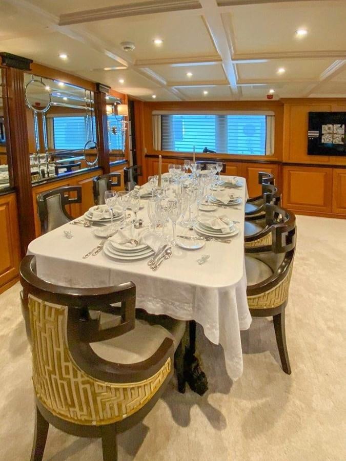 a table set for a dinner party aboard LADY HAYAT Yacht for Sale