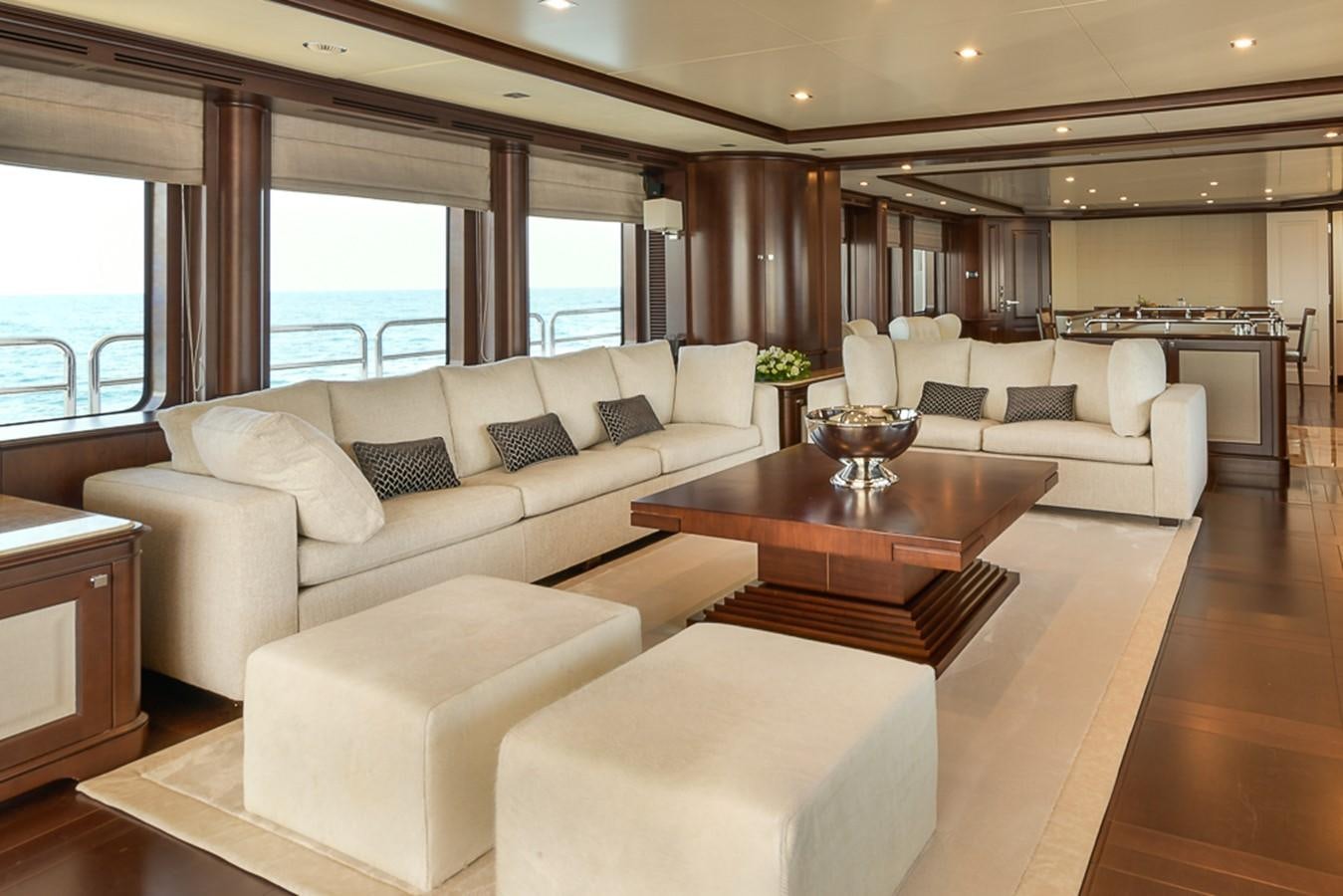 a living room with a large window aboard ELENA NUEVE Yacht for Charter