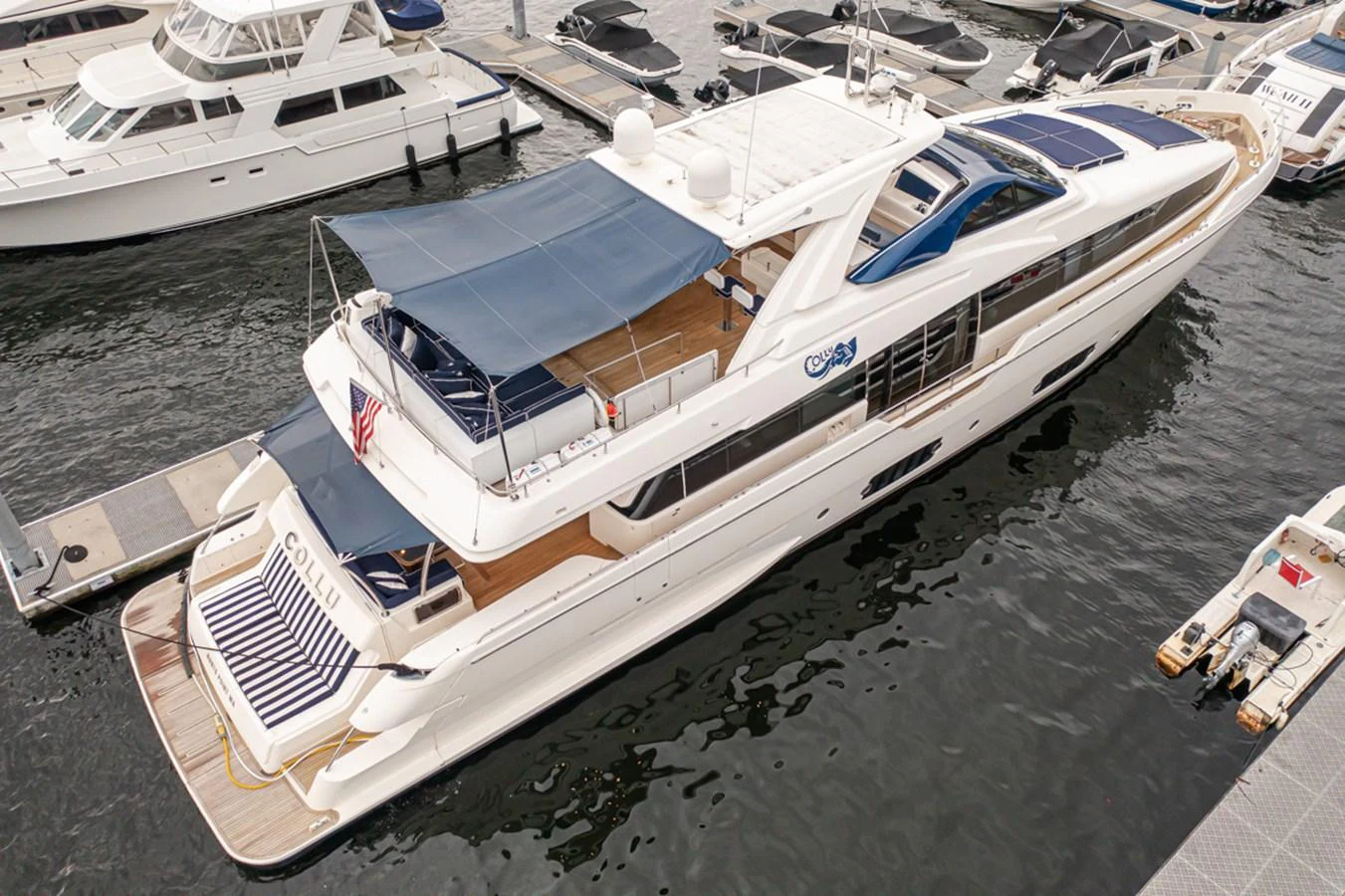 a boat docked at a pier aboard SOL SHINE Yacht for Sale
