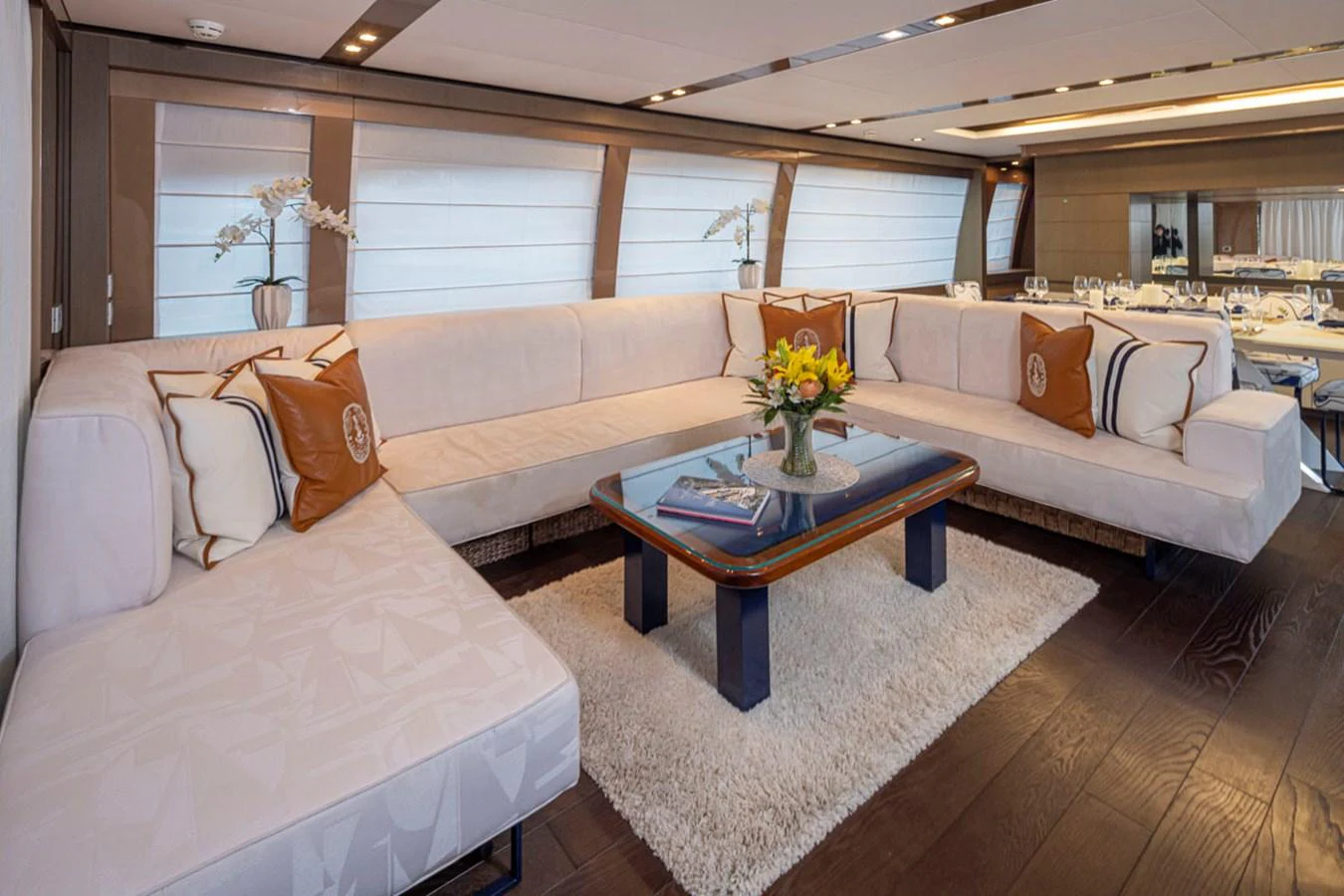a room with couches and a table aboard SOL SHINE Yacht for Sale