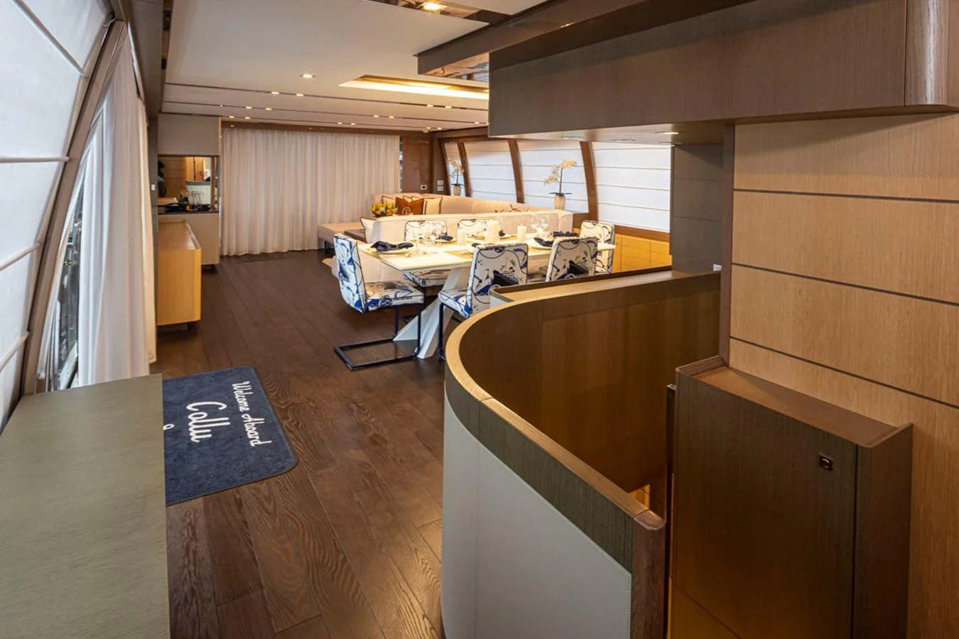 a room with a desk and chairs aboard SOL SHINE Yacht for Sale