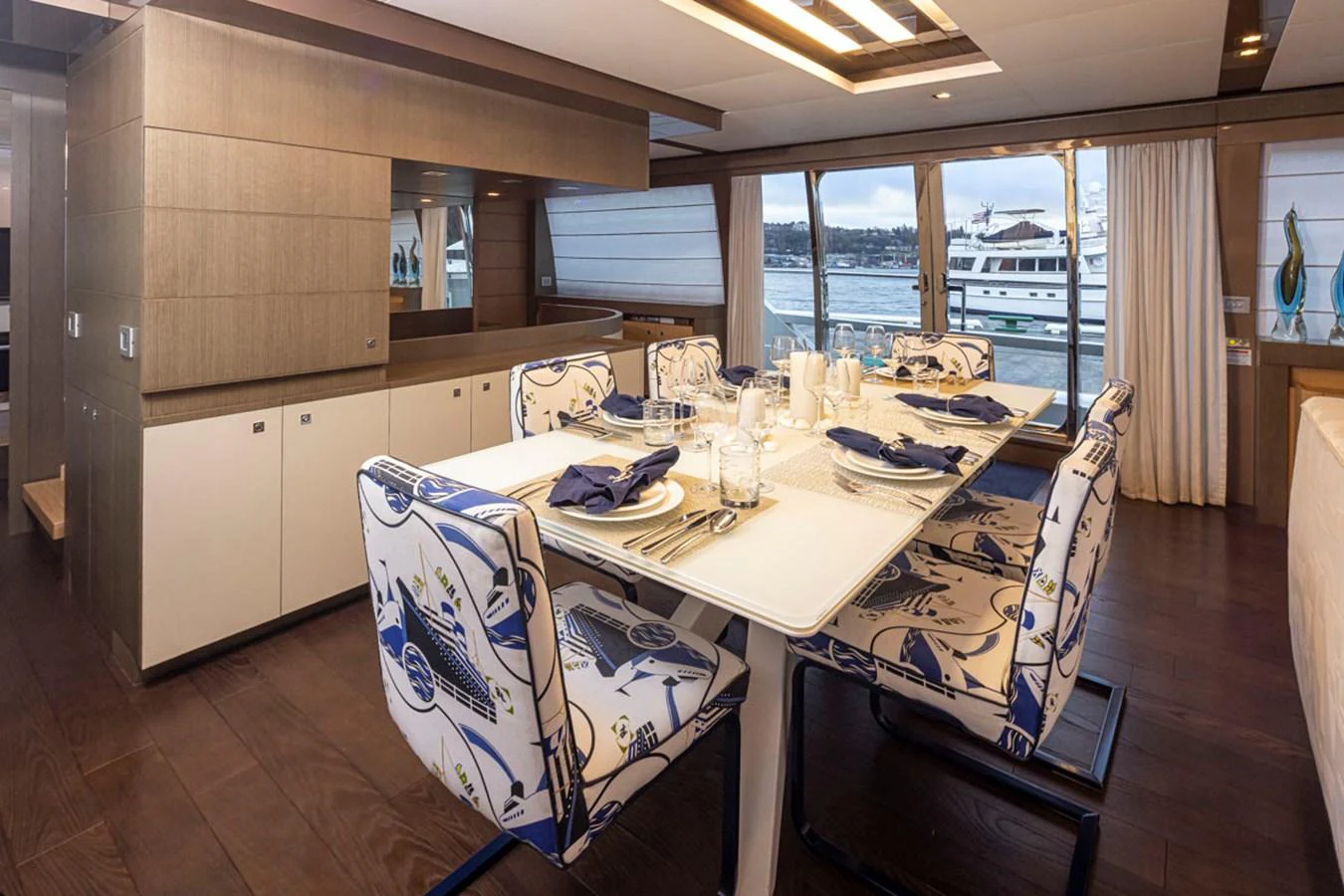a dining table in a kitchen aboard SOL SHINE Yacht for Sale