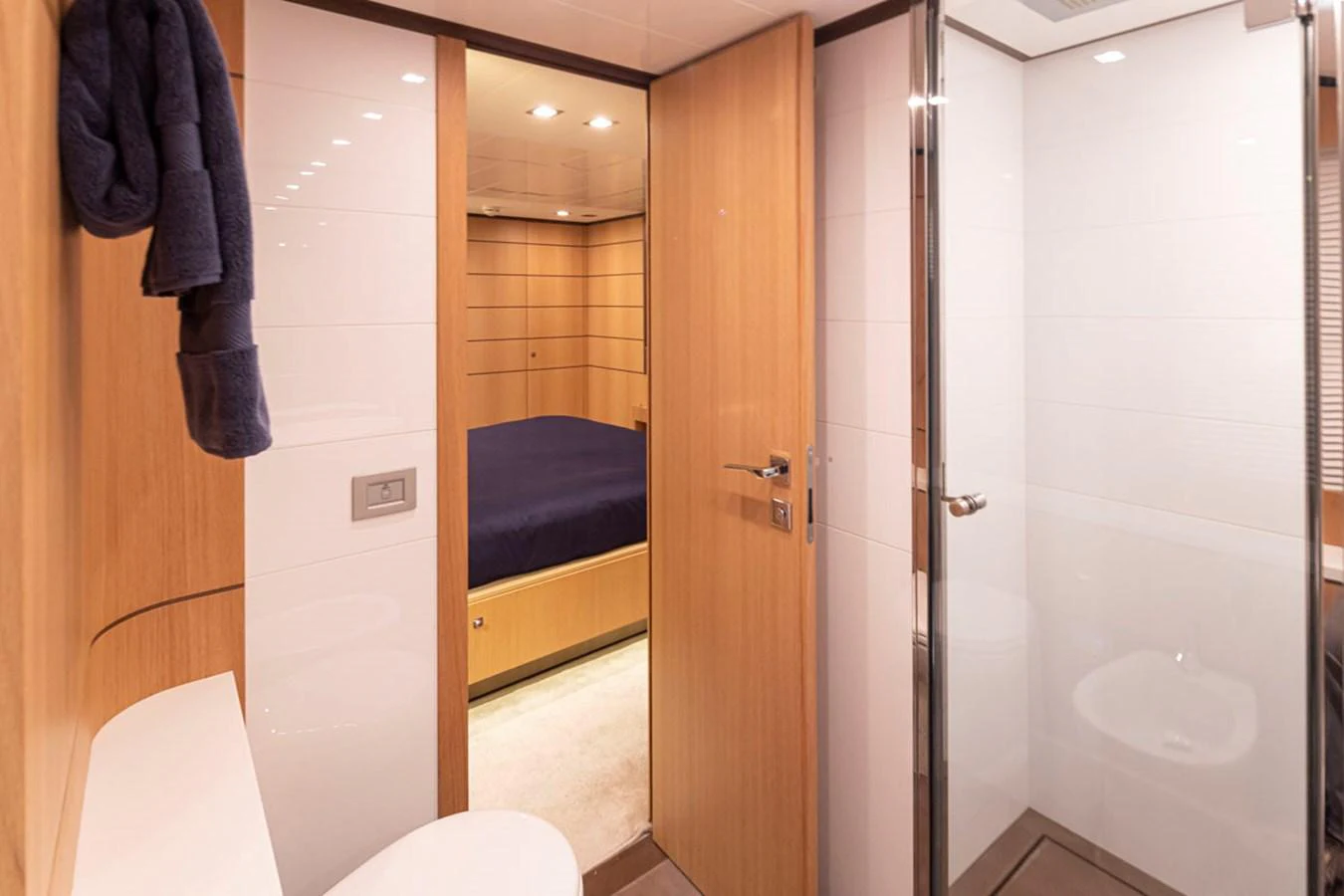 a bathroom with a glass shower aboard SOL SHINE Yacht for Sale