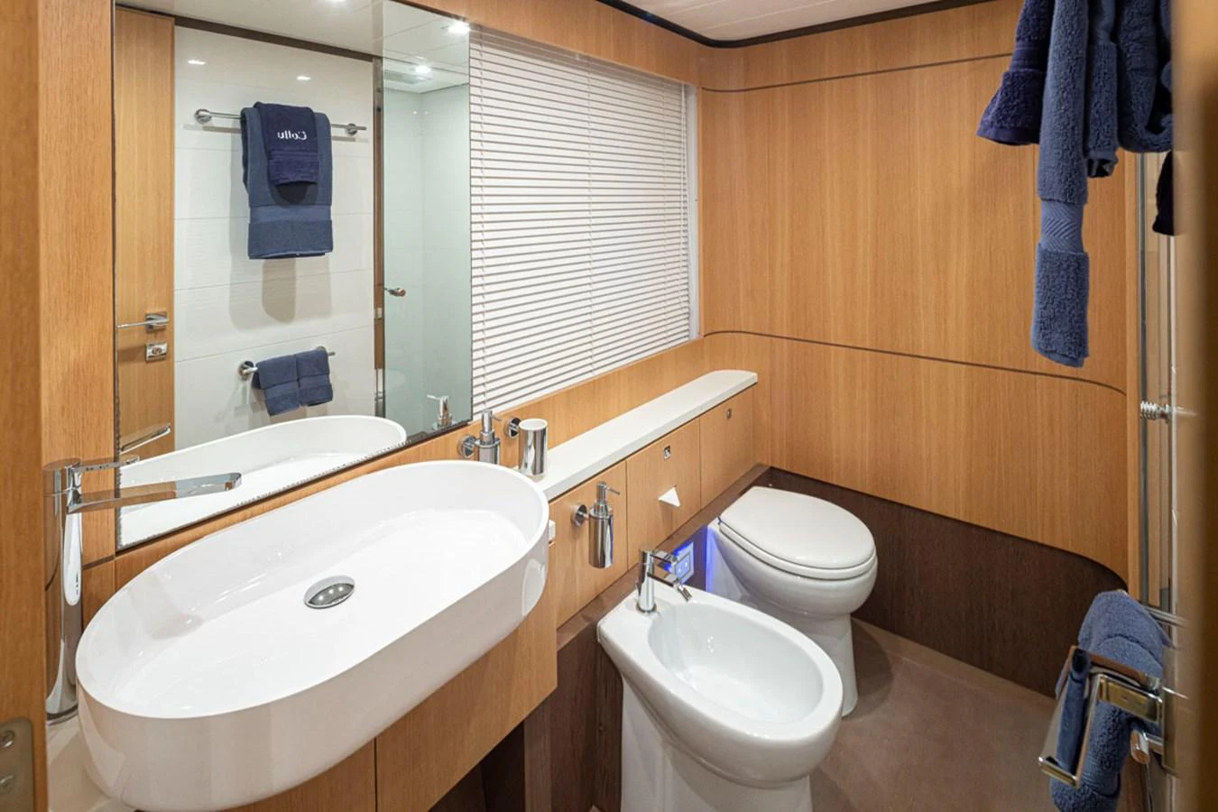 a bathroom with a sink and toilet aboard SOL SHINE Yacht for Sale