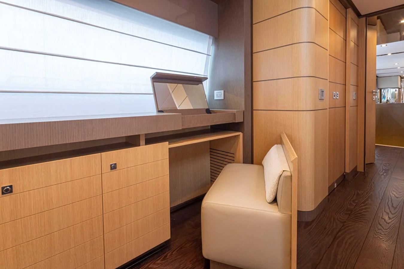 a room with a couch and a wood wall aboard SOL SHINE Yacht for Sale