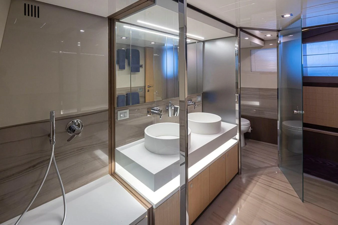 a bathroom with a large glass shower aboard SOL SHINE Yacht for Sale