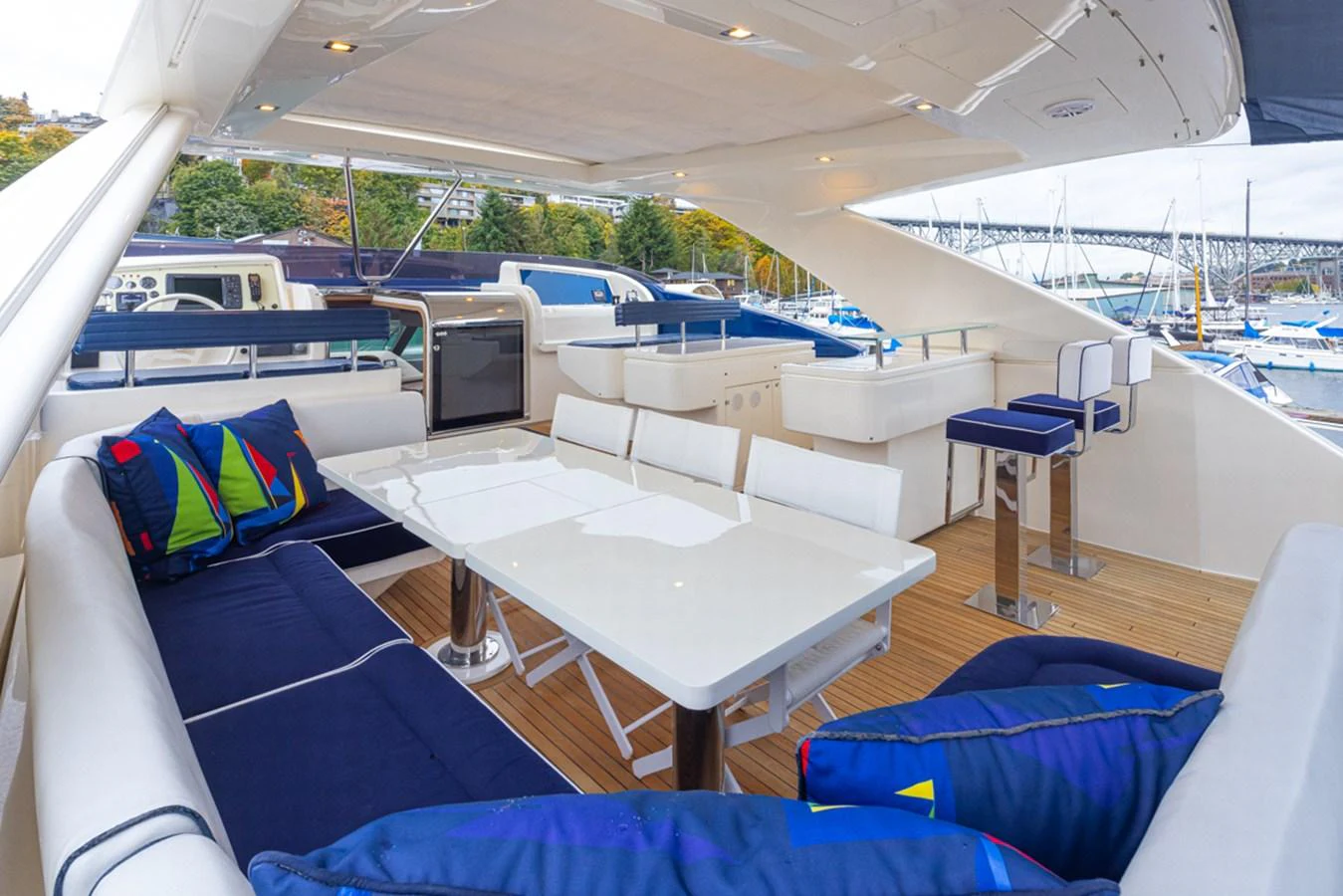 a boat with a table and chairs aboard SOL SHINE Yacht for Sale