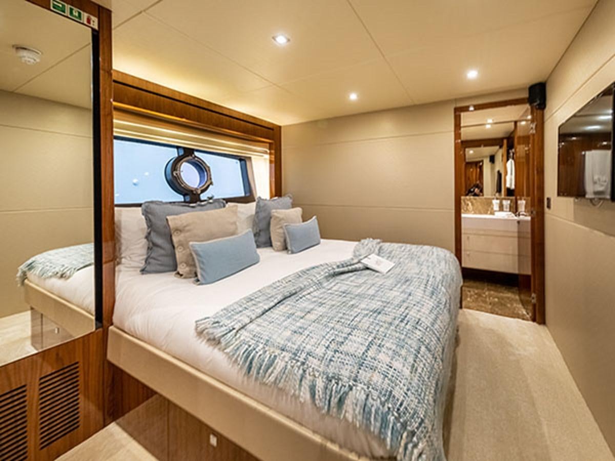 a bed in a hotel room aboard 28M Yacht for Sale