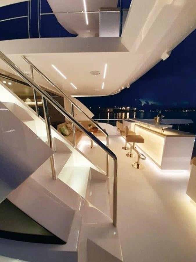 a white staircase in a room aboard CROWNED EAGLE Yacht for Sale