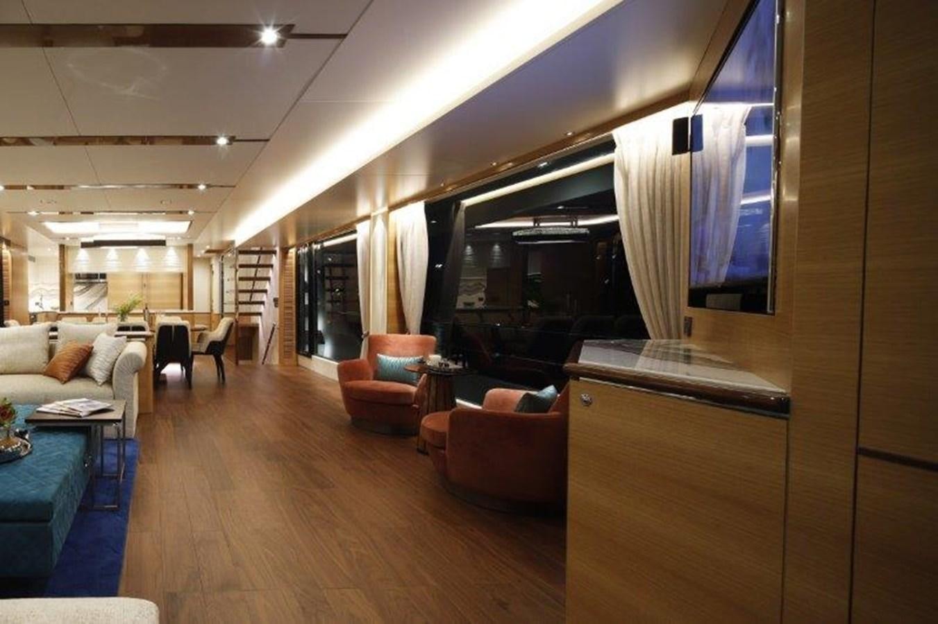 a room with a wood floor and a large window with a wood floor aboard CROWNED EAGLE Yacht for Sale