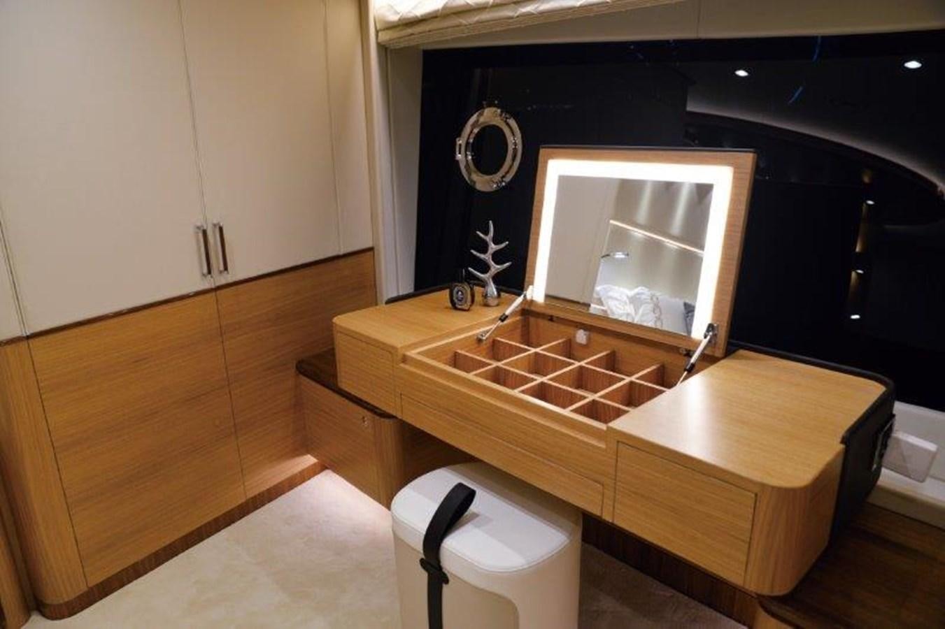 a bathroom with a sink and a mirror aboard CROWNED EAGLE Yacht for Sale