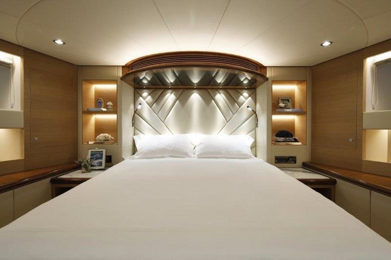 a large bed in a room aboard CROWNED EAGLE Yacht for Sale