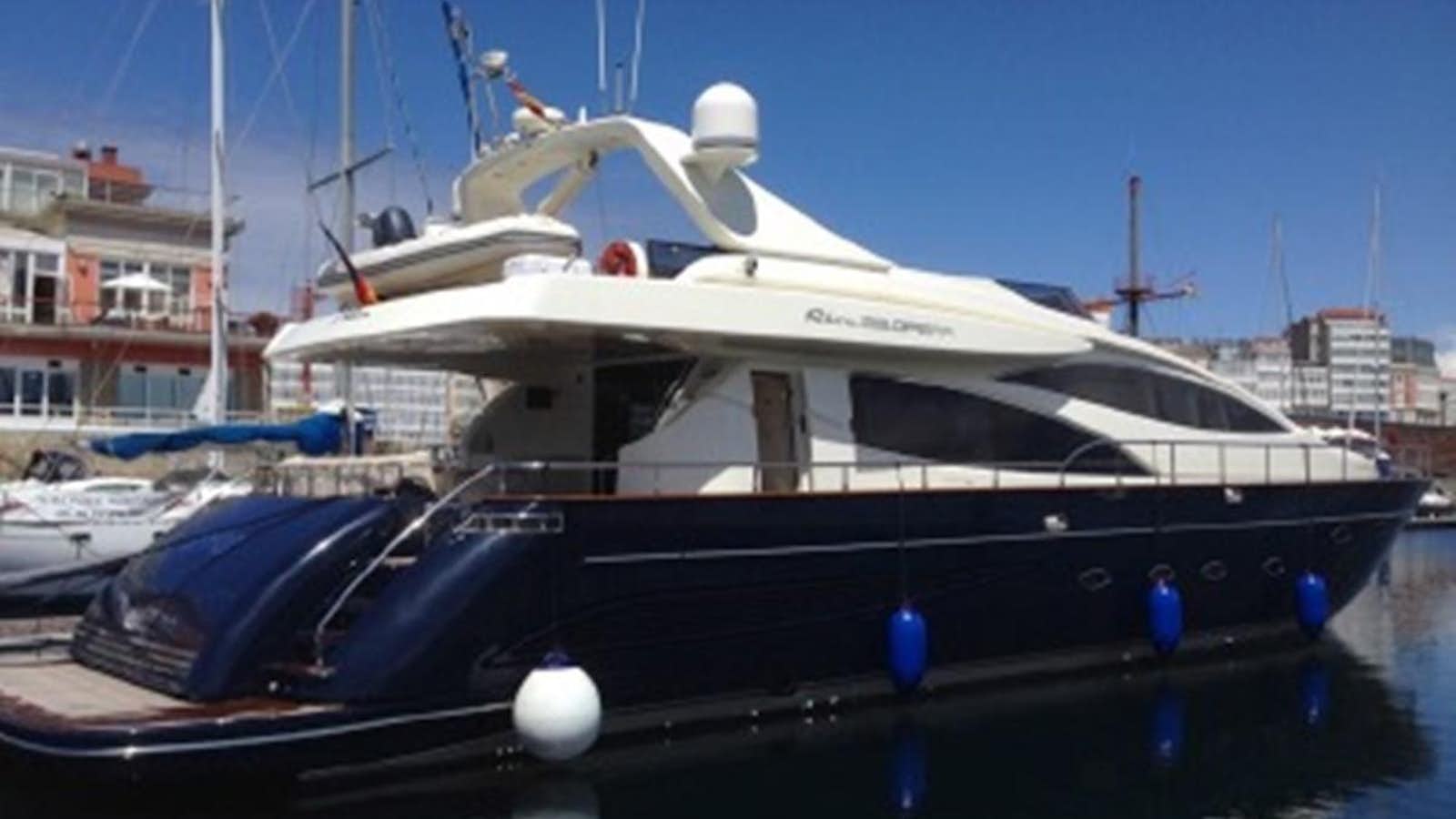 a boat docked at a pier aboard SPYRO Yacht for Sale