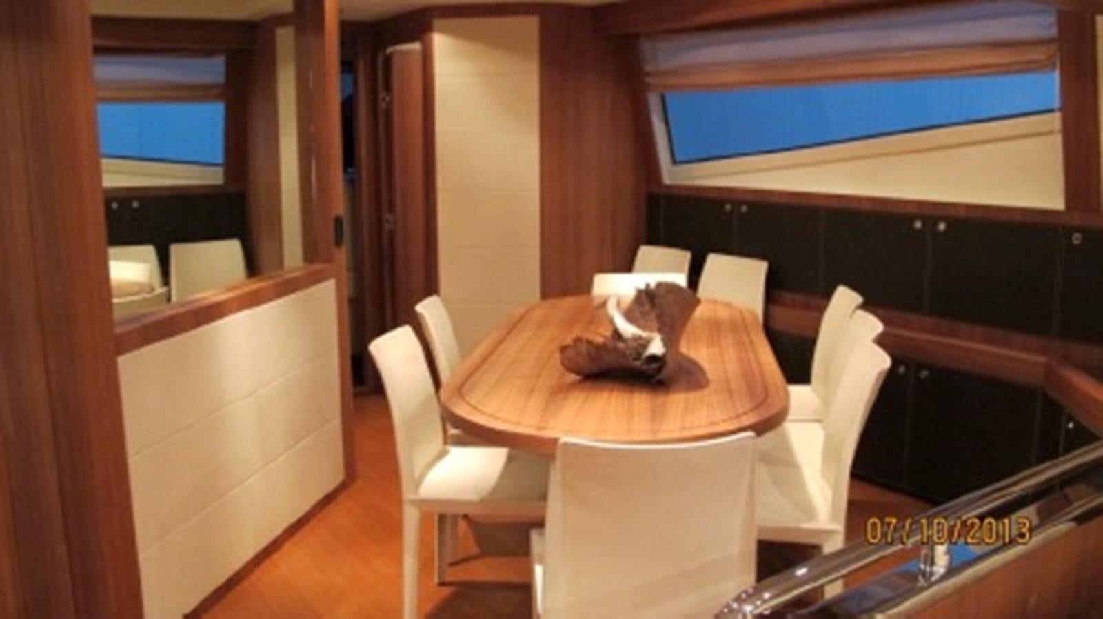 a cat sitting in a chair aboard SPYRO Yacht for Sale