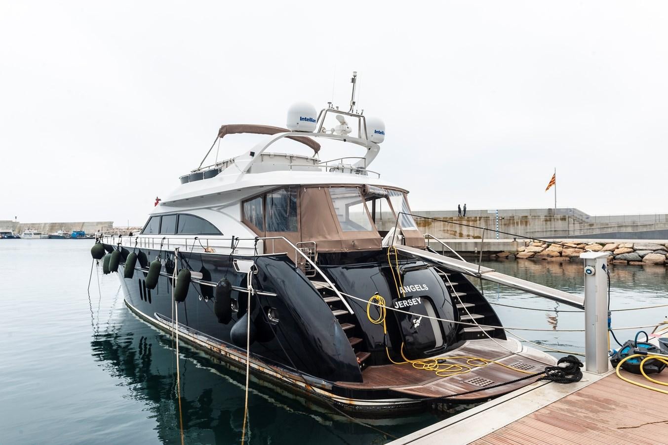 a boat is parked on the dock aboard ANGELS Yacht for Sale