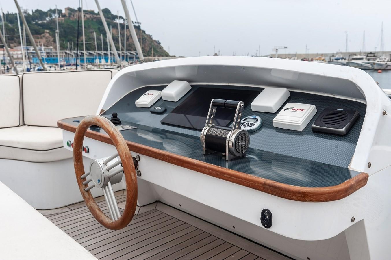 a car with a steering wheel aboard ANGELS Yacht for Sale