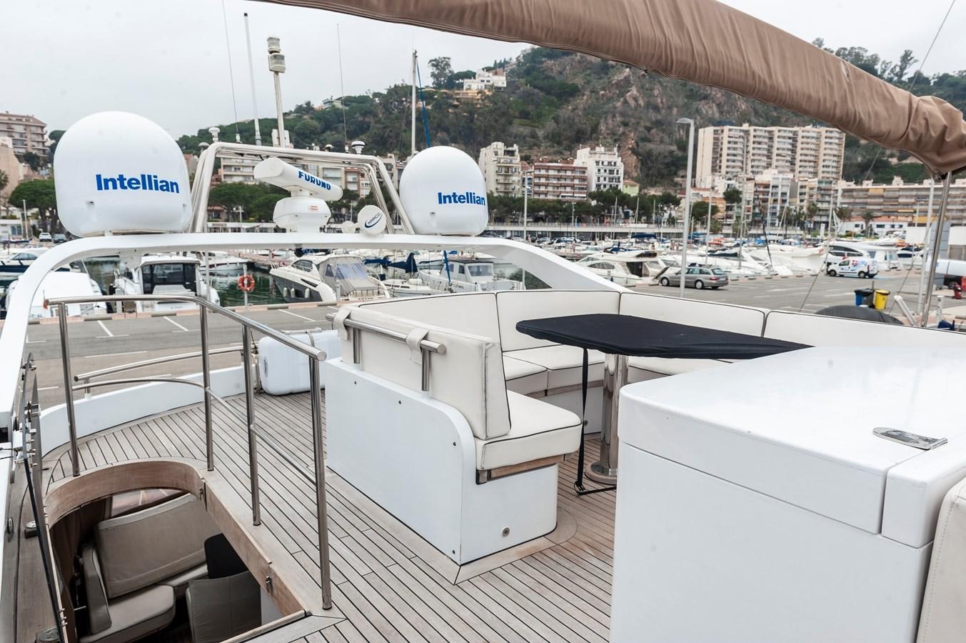 a table on a deck aboard ANGELS Yacht for Sale