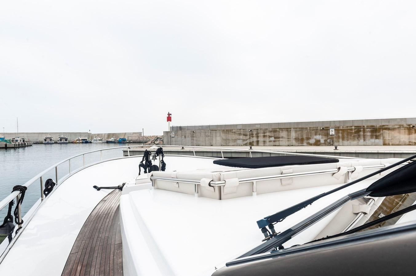 a person on a bike on a bridge over water aboard ANGELS Yacht for Sale