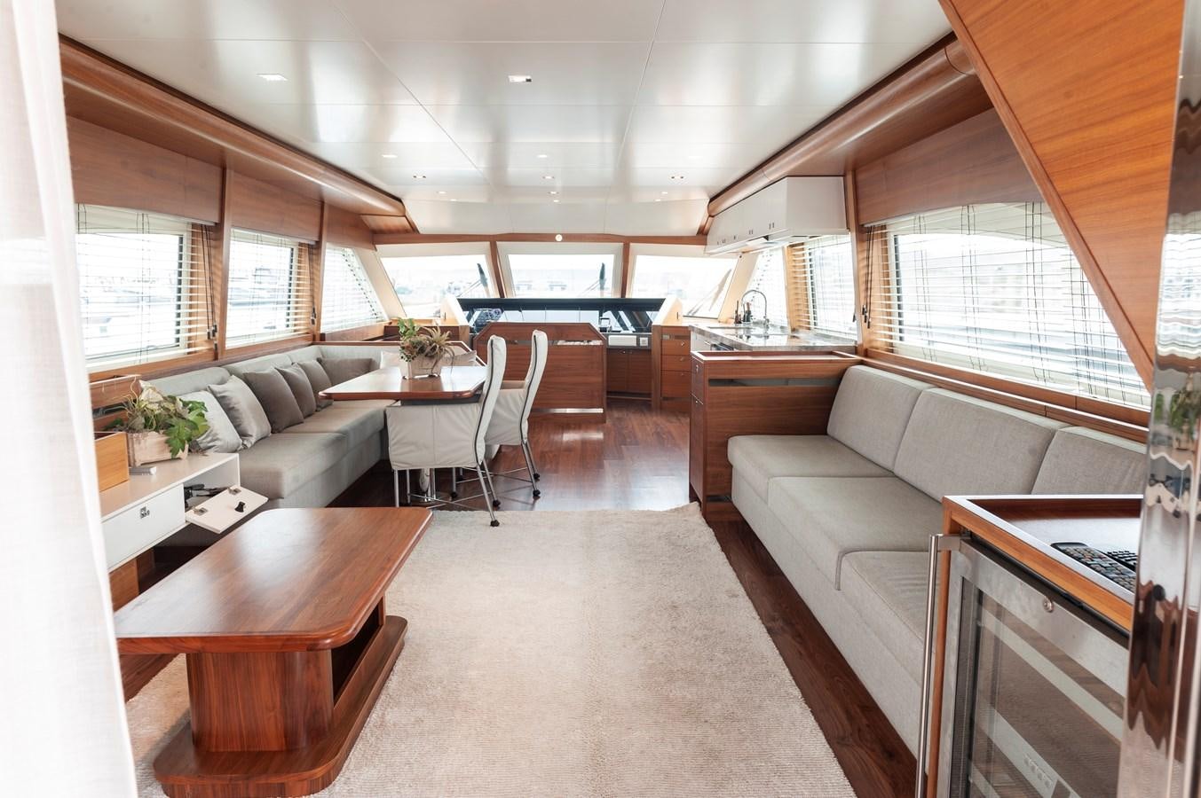 a living room with a couch and a coffee table aboard ANGELS Yacht for Sale