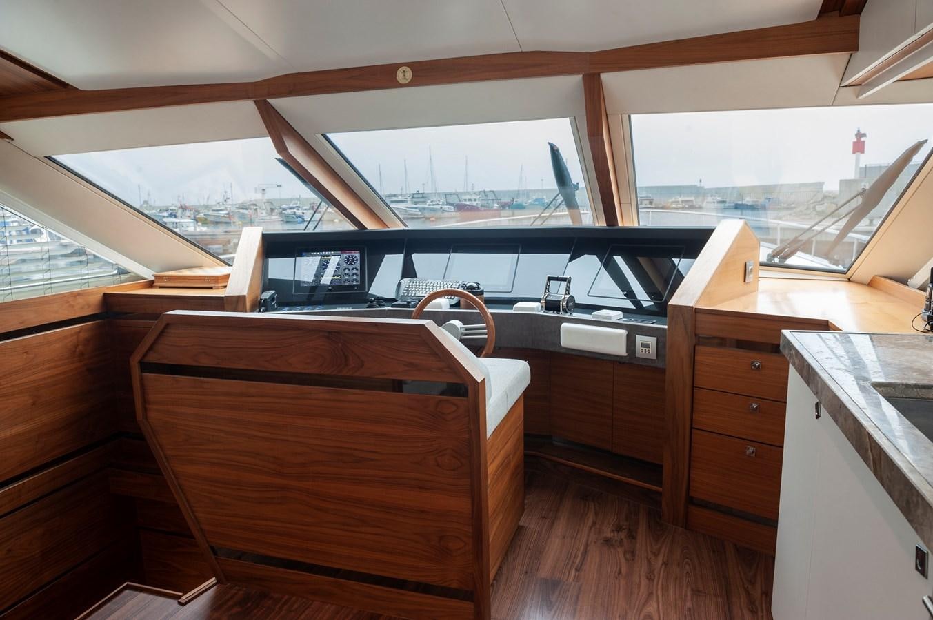 a wooden cabin with a large deck aboard ANGELS Yacht for Sale