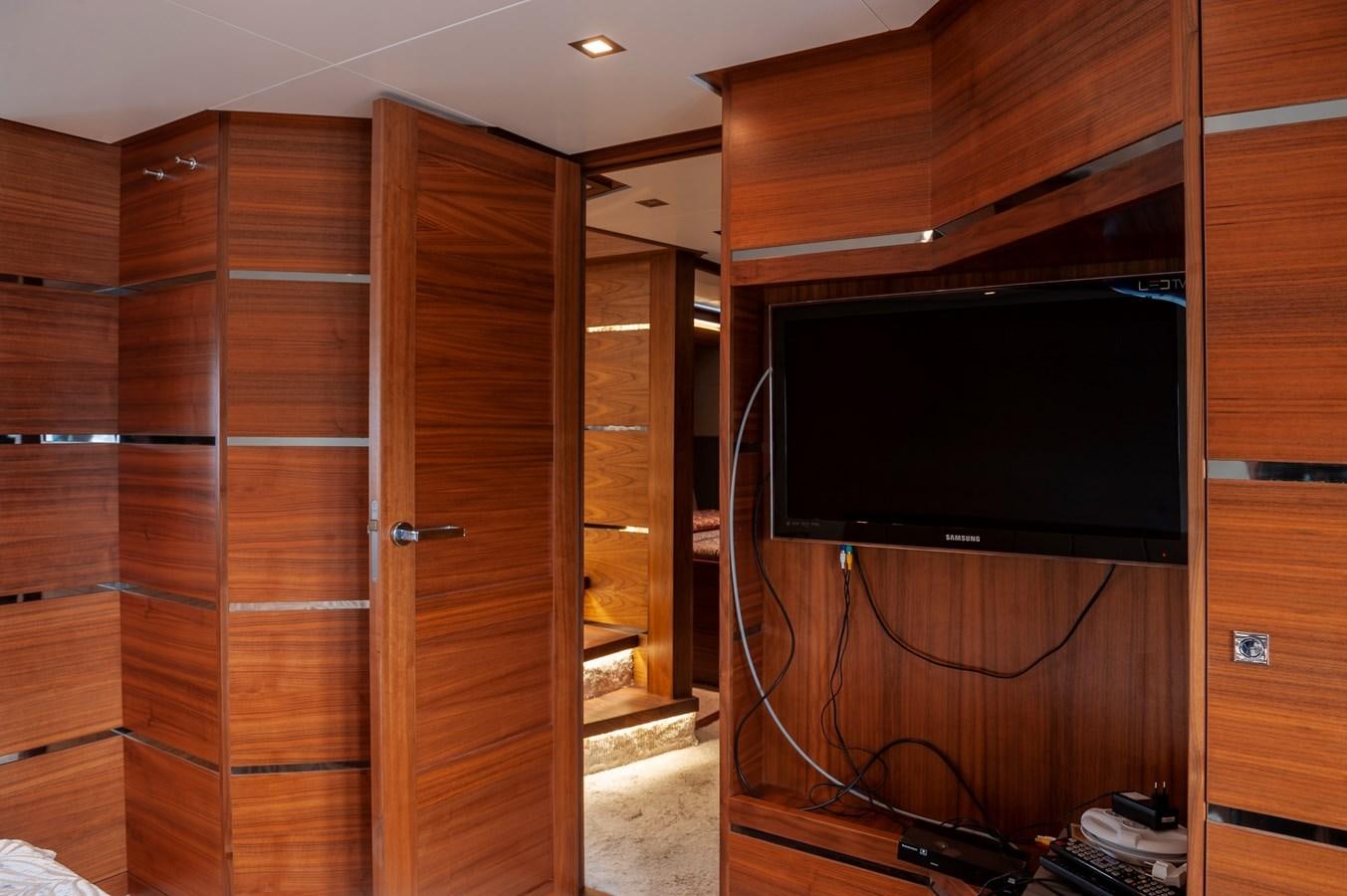 a tv in a wooden room aboard ANGELS Yacht for Sale