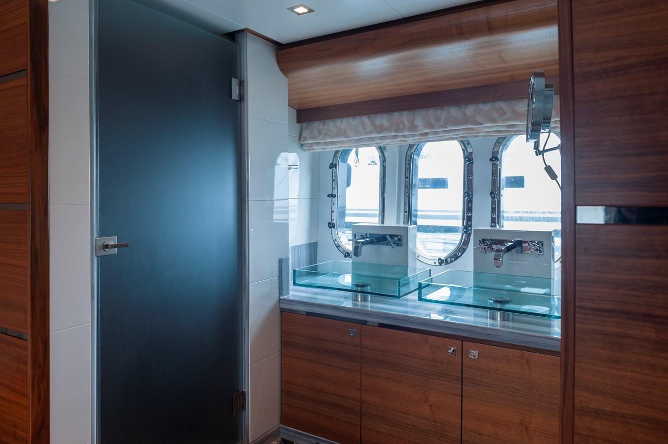 a room with a glass door aboard ANGELS Yacht for Sale
