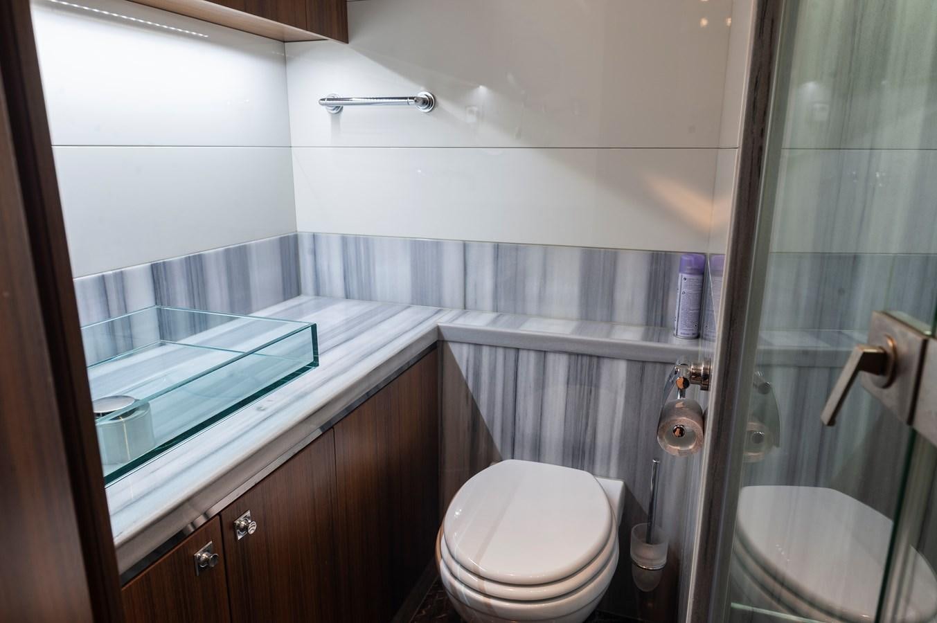 a bathroom with a tub and toilet aboard ANGELS Yacht for Sale