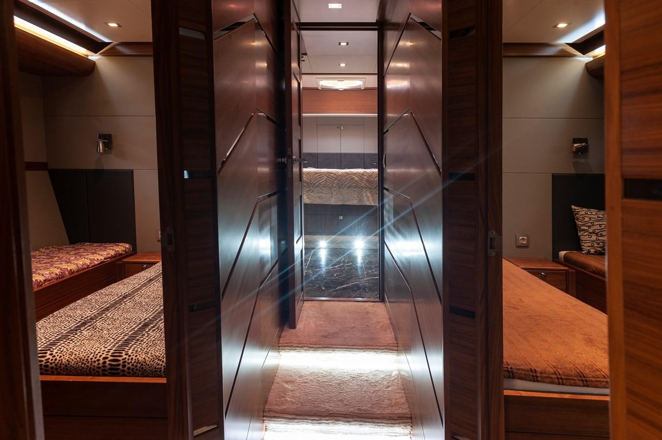 a room with a glass door aboard ANGELS Yacht for Sale