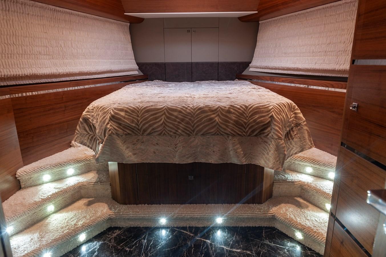 a bed in a room aboard ANGELS Yacht for Sale