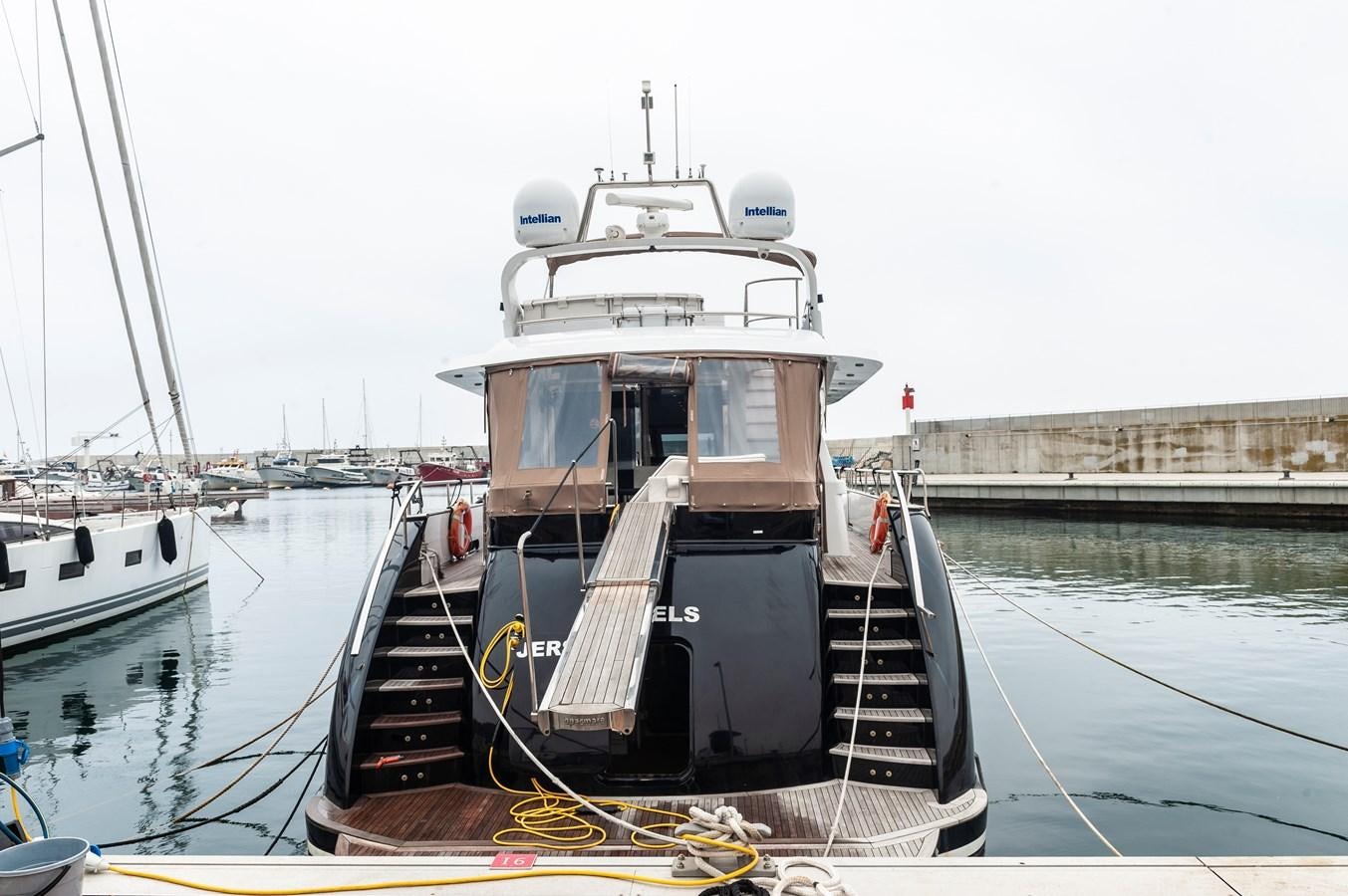 a boat tied to a dock aboard ANGELS Yacht for Sale