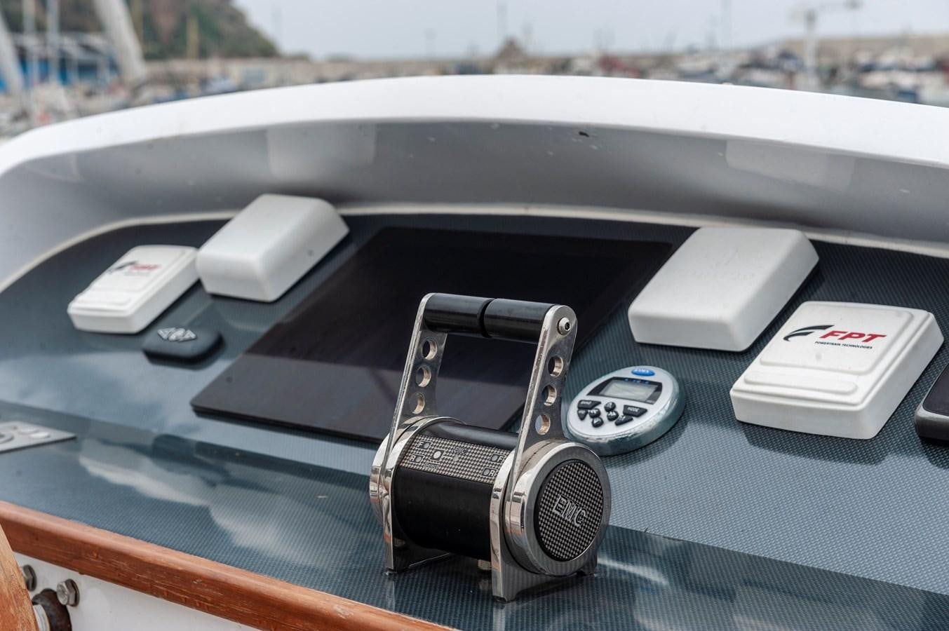 a car with a display of cell phones on it aboard ANGELS Yacht for Sale