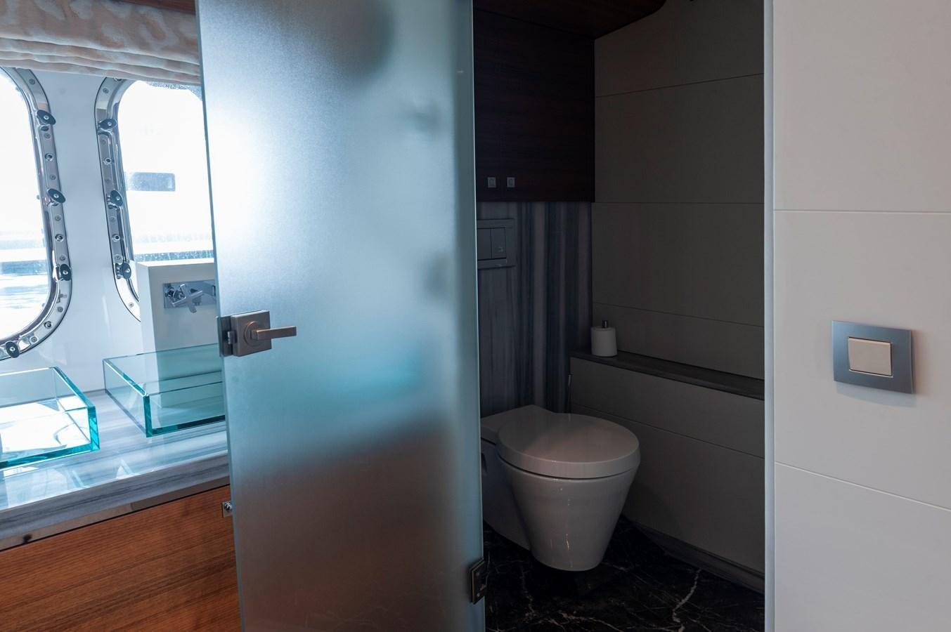 a bathroom with a glass door aboard ANGELS Yacht for Sale