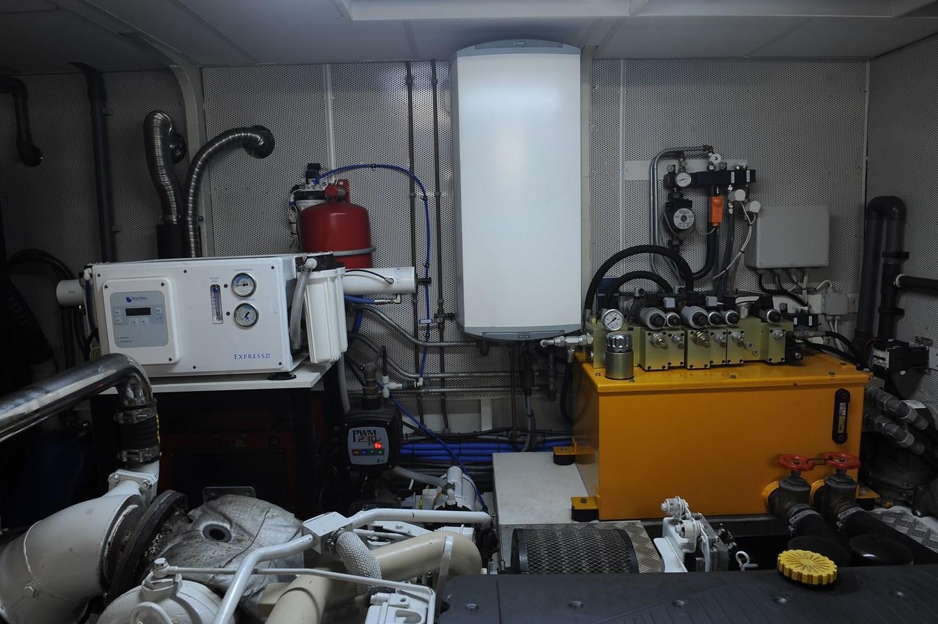 a machine in a room aboard ANGELS Yacht for Sale