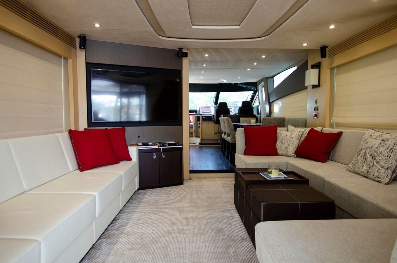 a room with a couch and a table aboard SECOND THOUGHTS Yacht for Sale