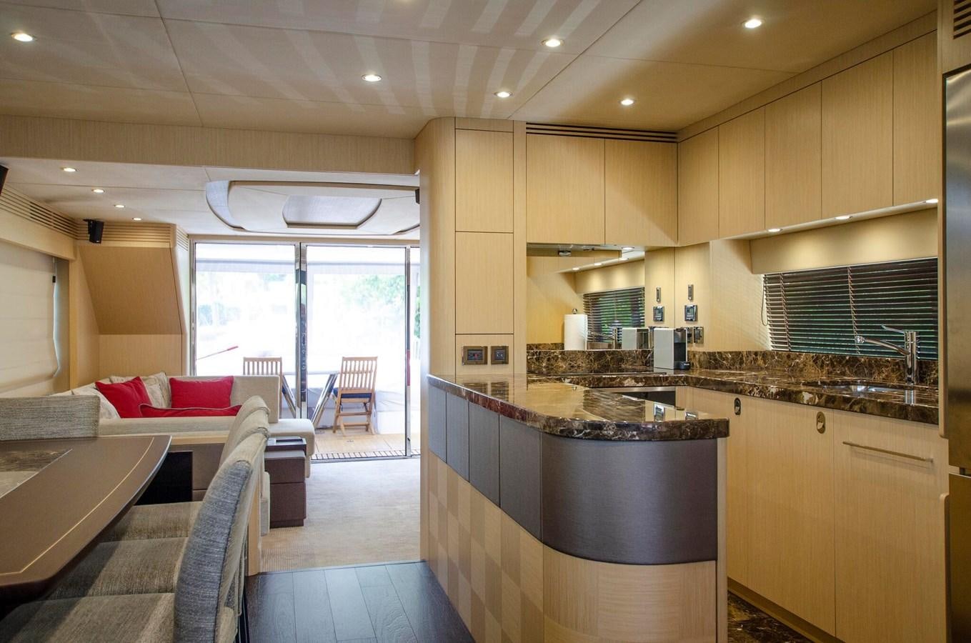 a kitchen with a large island aboard SECOND THOUGHTS Yacht for Sale