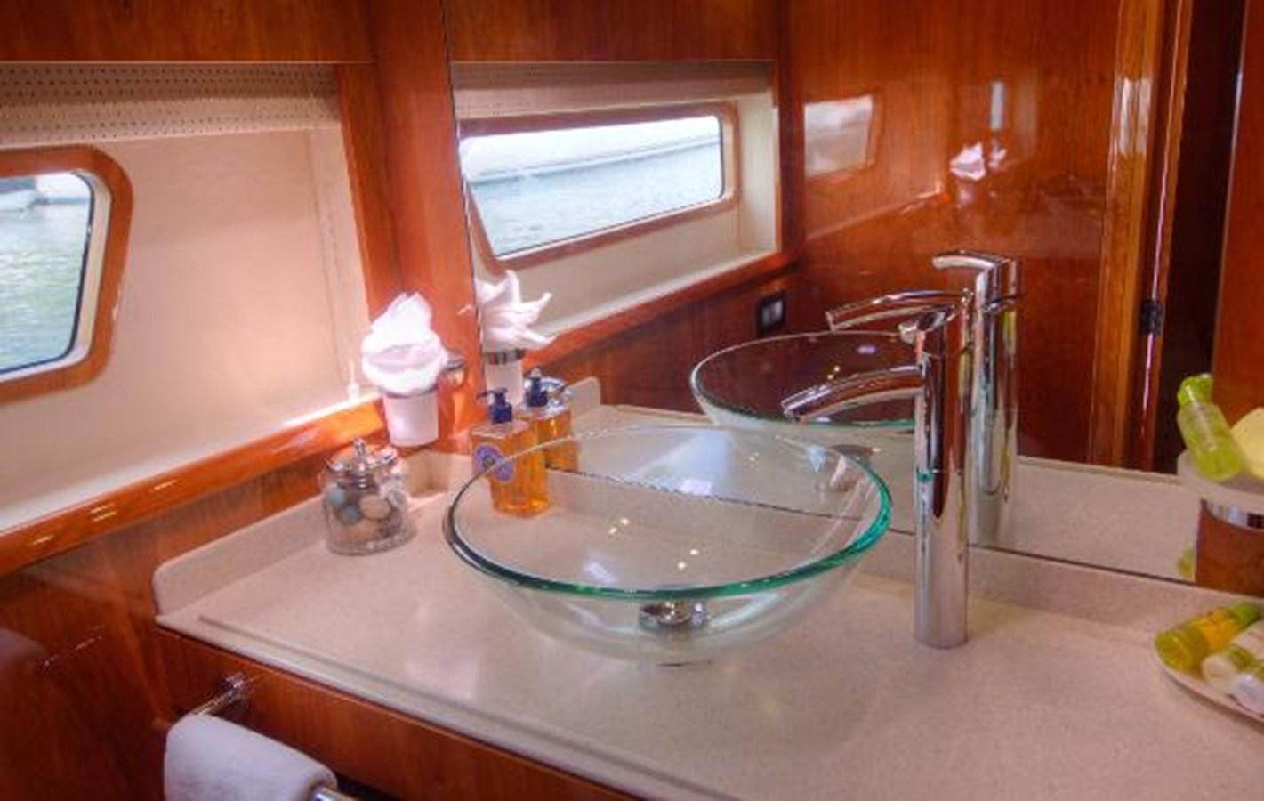 a sink with a faucet aboard 74' PRIVILEGE 2010 Yacht for Sale