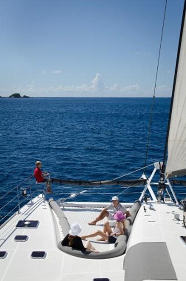 a group of people on a boat aboard 74' PRIVILEGE 2010 Yacht for Sale