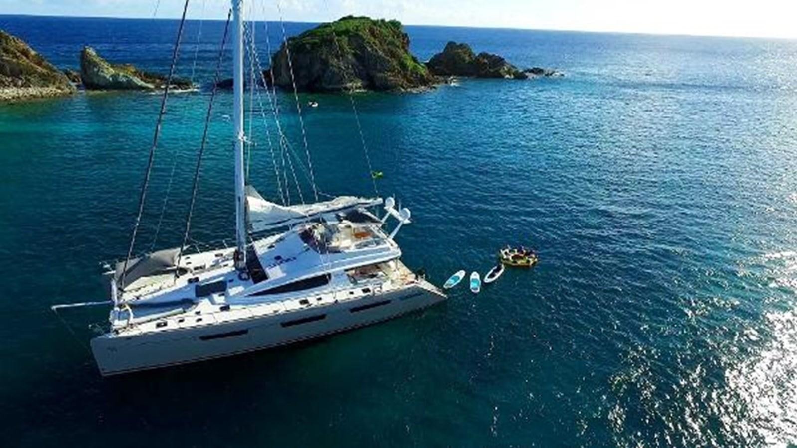 a boat sailing in the sea aboard 74' PRIVILEGE 2010 Yacht for Sale